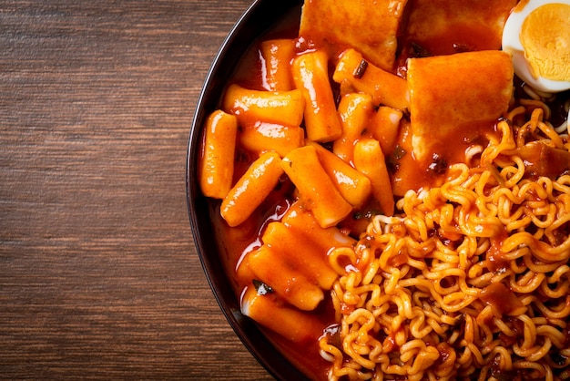 Korean instant noodles with Korean rice cake and fish cake and boiled egg - Rabokki - Korean food style