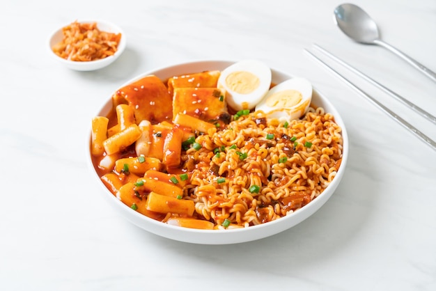 Korean instant noodles with Korean rice cake and fish cake and boiled egg - Rabokki - Korean food style