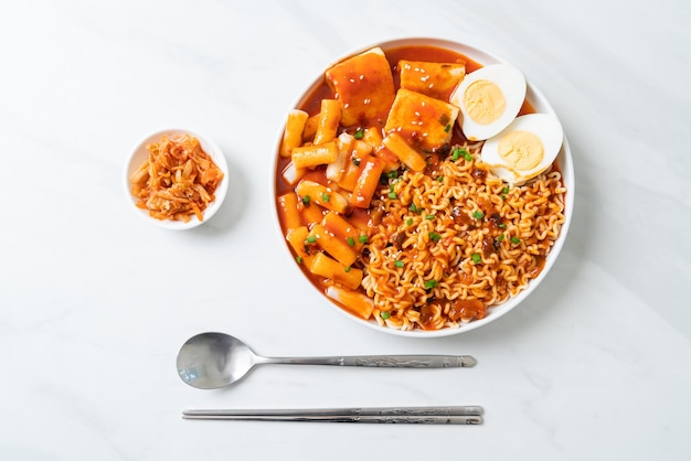 Korean instant noodles with Korean rice cake and fish cake and boiled egg