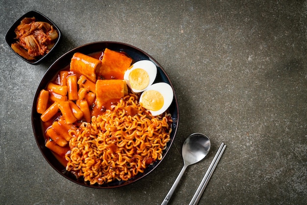 Korean instant noodles with Korean rice cake and fish cake and boiled egg