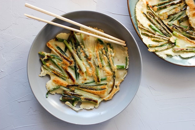 Korean pancakes with green onion and soy sauce