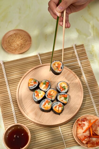 Korean roll Gimbap(kimbob) made from steamed white rice (bap) and various other ingredients