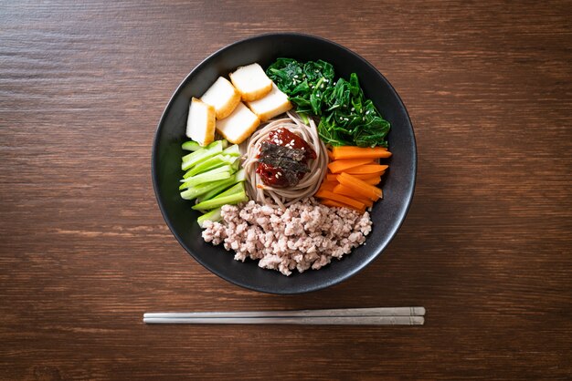 Korean spicy cold noodles - bibim makguksu or bibim guksu - Korean food style