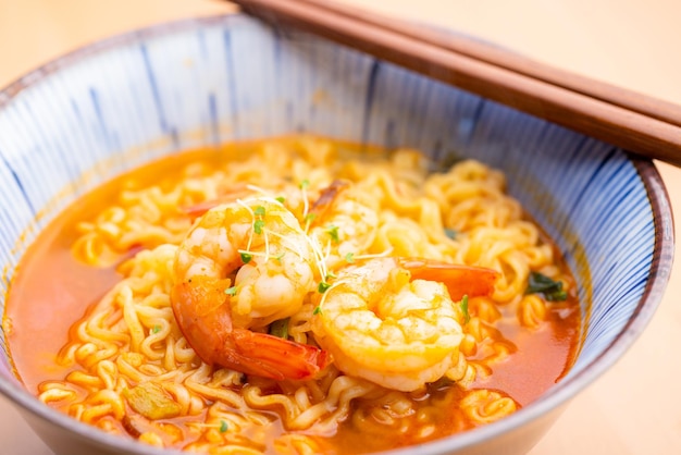 Korean spicy instant noodles with shrimp bowl