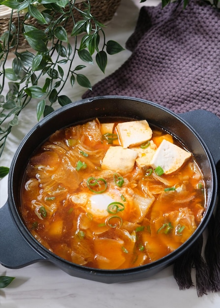 Korean spicy silken tofu stew which is called Sundubu Jjigae. Popular food in Korean Drama