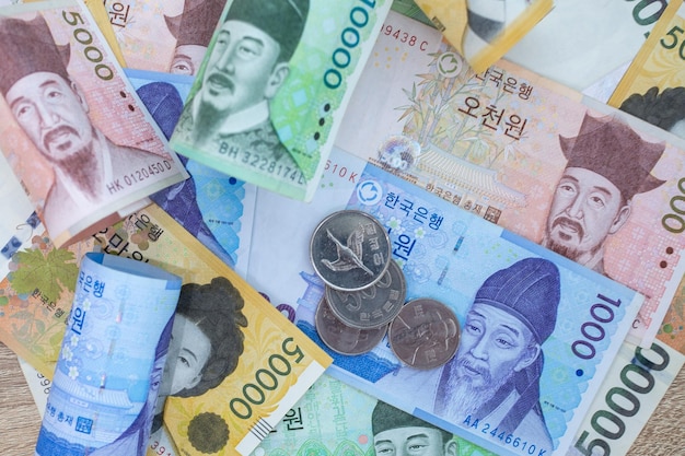 Korean won notes and Korean won coins for money concept background