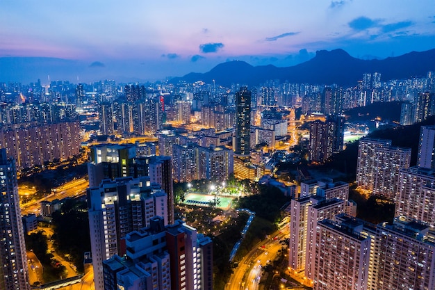 Kowloon Bay, Hong Kong 25 April 2019: Drone fly over Hong Kong city at night