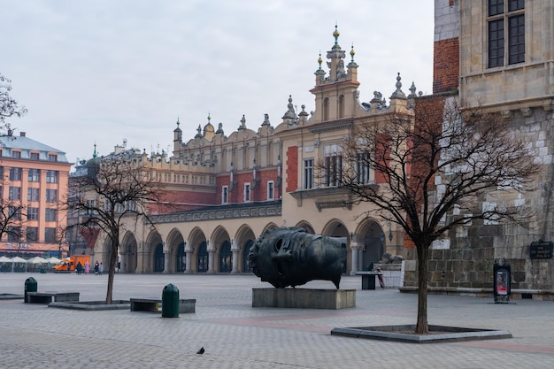 Krakow Poland 13 March 2022 Eros Bendato head statue sculpture of Krakow Old Town Main Market Square