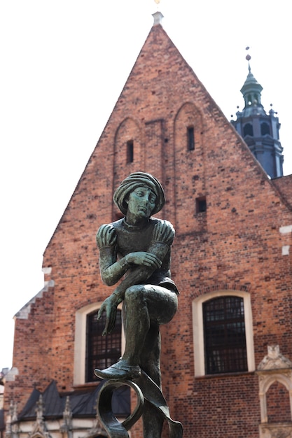 Krakow, Poland - 27 Jul, 2013: Beautiful architecture of old Krakow. City square in Krakow