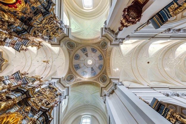 KRAKOW POLAND AUGUST 2022 interior dome and looking up into a old gothic catholic church ceiling