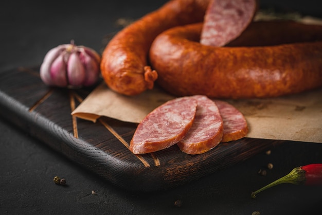 Krakow sausage on a dark background