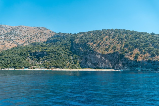 Kroreza or Krorez beach seen from the boat on the Albanian riviera near Sarande and its turquoise waters Albania