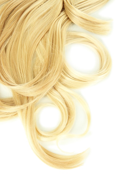 Krullend blond haar close-up geïsoleerd op white