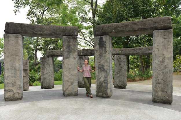 Kuala Lumpur Malaysia March 16 2016 Tourist woman near Stonehenge replica at the National Planetarium Negara