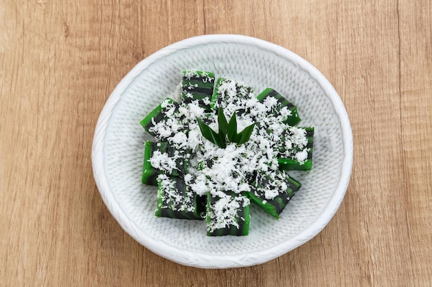 Kue Jongkong layer cake with grated coconut, Indonesian traditional snack