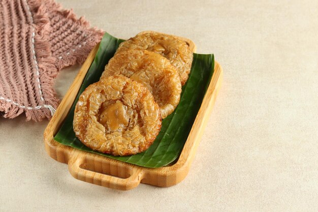 Kue Kucur or Kucur or kuih cucur and called khanom fak bua or khanom jujun in Thai