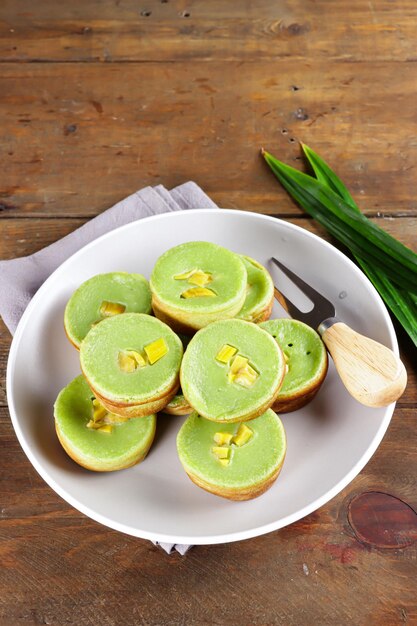 Kue lumpur pandan is Indonesian traditional pancake made from sweet potatoes and coconut milk