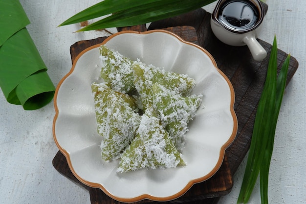 kue lupis Indonesian Traditional Snack Made From Sticky Rice, Wrapped with Banana Leaf,