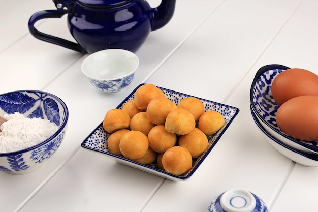 Kue Nastar or Indonesian Pineapple Tart Cookies Stuffed with  Pineapple Jam. Made from Flour, Egg, Butter, and Sugar. Popular for Hari Raya Lebaran and Christmas. Selective focus