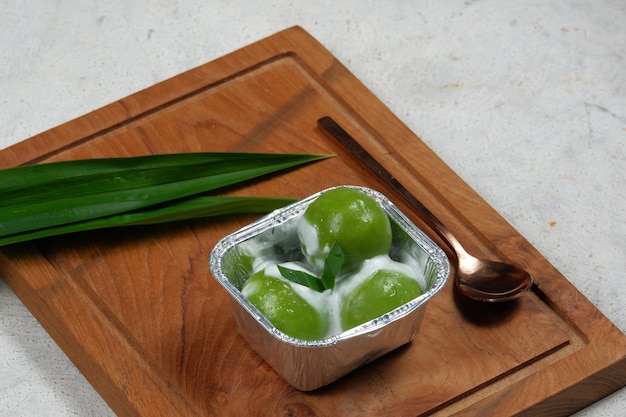 kue putri mandi or or badak berendam Are Steamed glutinous rice balls filled with coconut brown suga