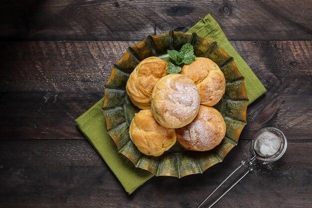 Photo kue sus or vanilla soes cakes sus vla a traditional french choux dough filled with custard