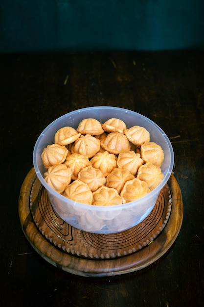 Kuih bahulu baulu or bolu sponge cake baked asian tradition food