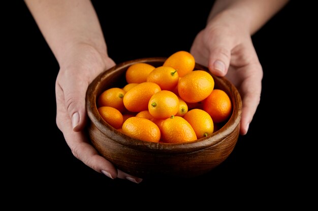 Kumquat, kleine ovale citrusvruchten, nagami-variëteit