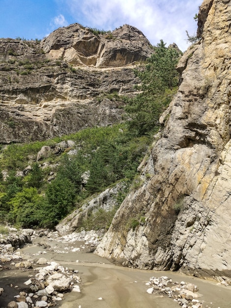 The Kvartakh River in the narrow Karadakh mountain gorge in the sunlight in Dagestan Russia June 2021