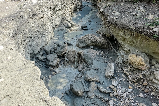 The Kvartakh River in the narrow Karadakh mountain gorge in the sunlight in Dagestan Russia June 2021