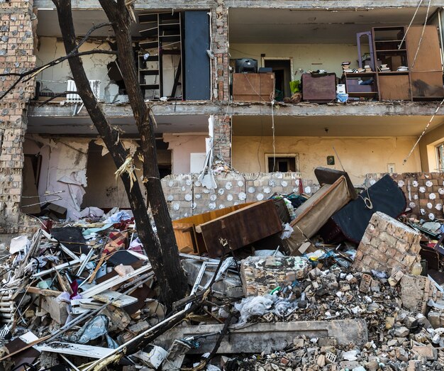 KYIV UKRAINE Mar 21 2022 War in Ukraine Residential building damaged by falling debris after Russian rocket attack on Kyiv