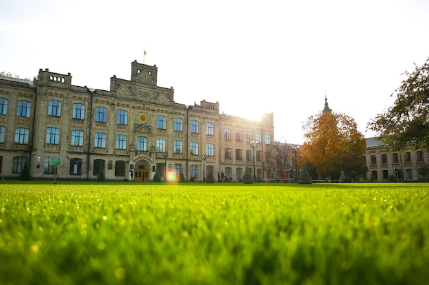 KYIV, UKRAINE - OCTOBER 12, 2019: National Technical University of Ukraine. Kyiv Polytechnic Institute. Green grass lawn.