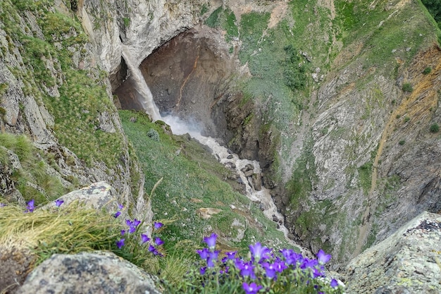 Kyzylsu Waterfall surrounded by the Caucasus Mountains near Elbrus Jilysu