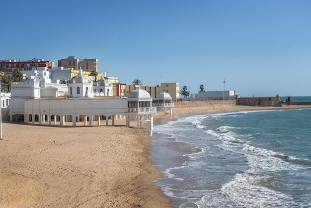 Photo la caleta beach and balneario de la palma building cadiz andalusia spain