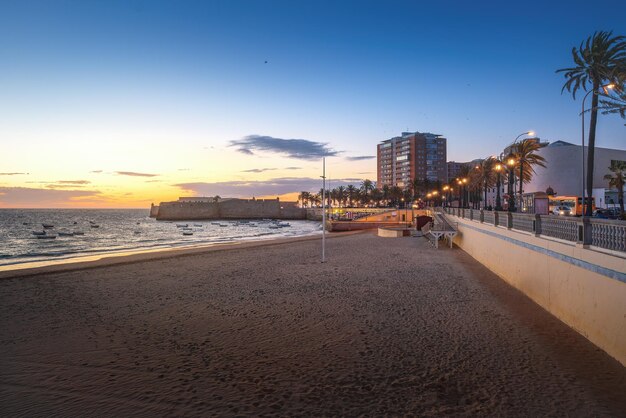 La Caleta Beach and Castle of Santa Catalina at sunset Cadiz Andalusia Spain