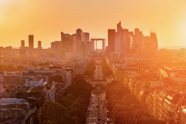 La defense district business in paris at sunset, view from arc de triomphe