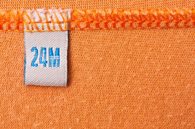 Label on orange cloth