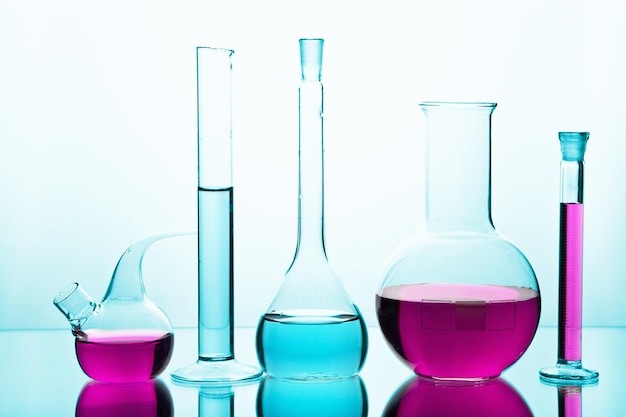 Laboratory glassware with colorful chemicals