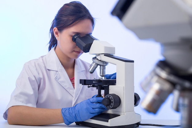 Laboratory microscope research Scientist people study and anlaysis in lab room