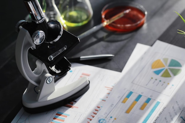 Laboratory research. Drug testing. Chemical experiments in the laboratory. Microscope various test tubes and beakers on the table at the medical officer.