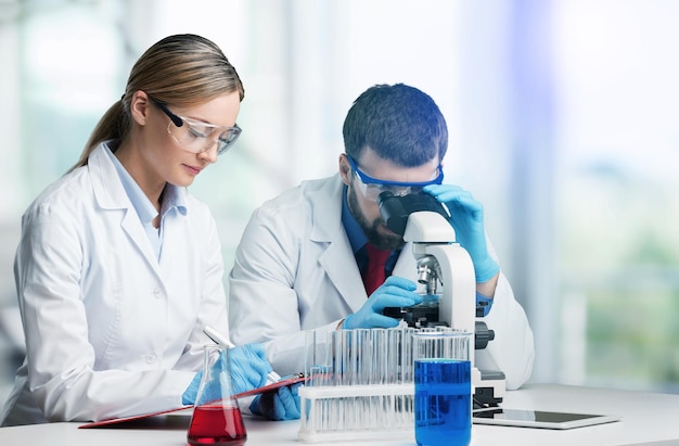 Laboratory technician preparing a sample to analyze in the lab