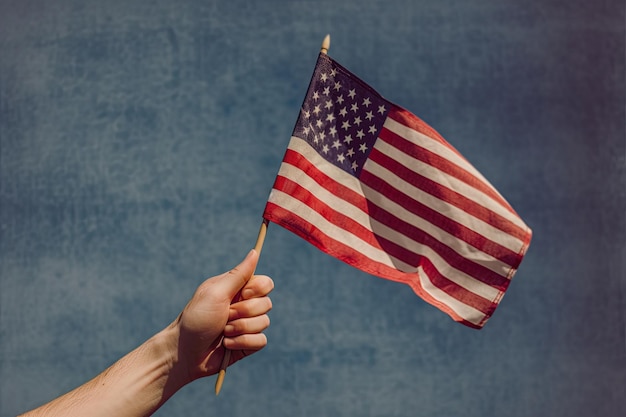 Labour day hand holding usa flag