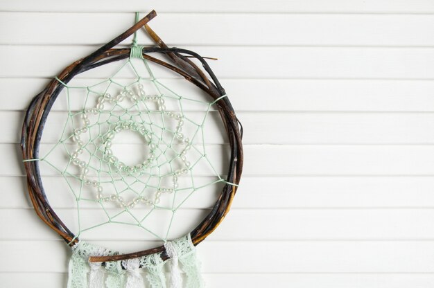 Lace dream catcher on door