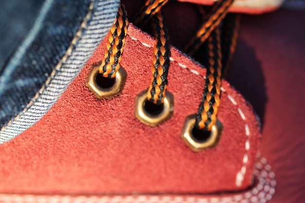 Laces in red shoes close up