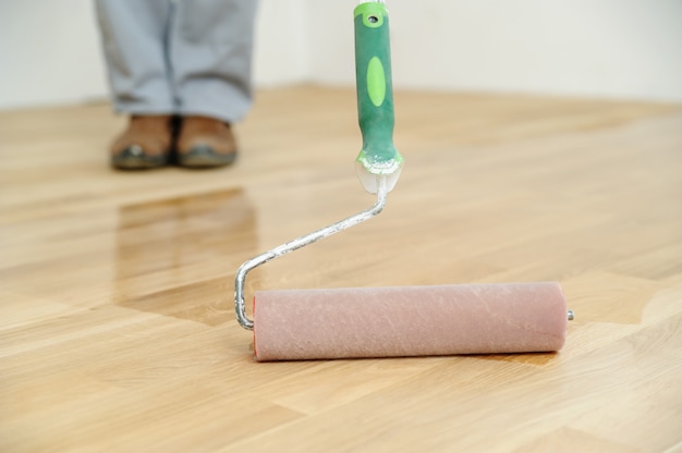 Lacquering wood floors.