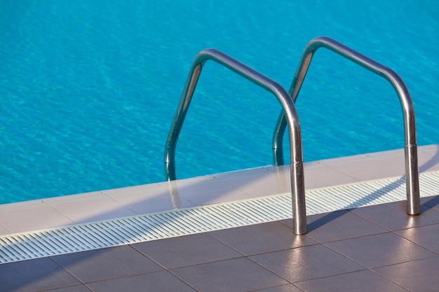 Ladder of a swimming pool Horizontal shot