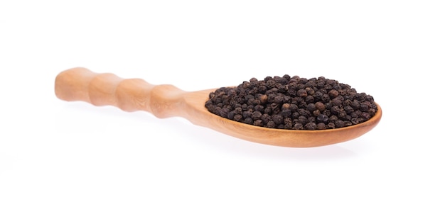 ladle of black pepper isolated on white background