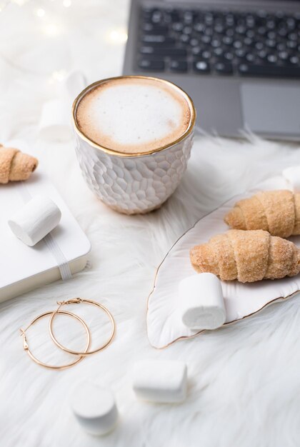 Lady bloggers white work space with gold details