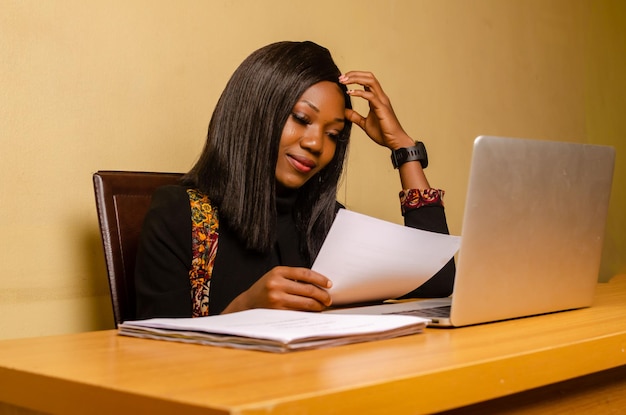 Lady confused about the document on her hand