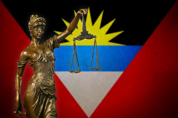 Lady Justice against a flag of Antigua and Barbuda