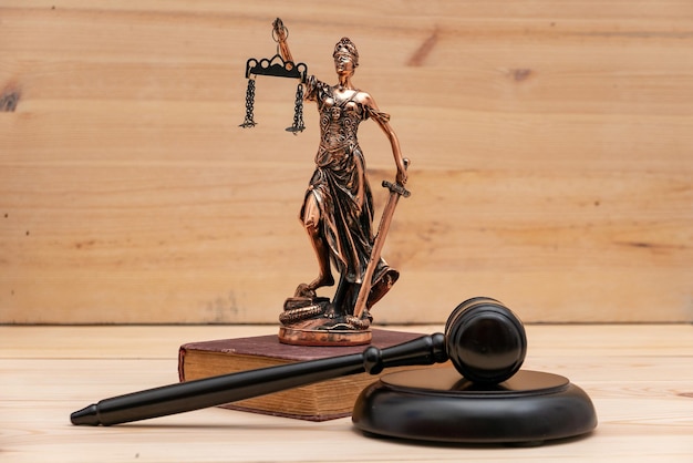 Lady Justice Law symbols in bokeh background